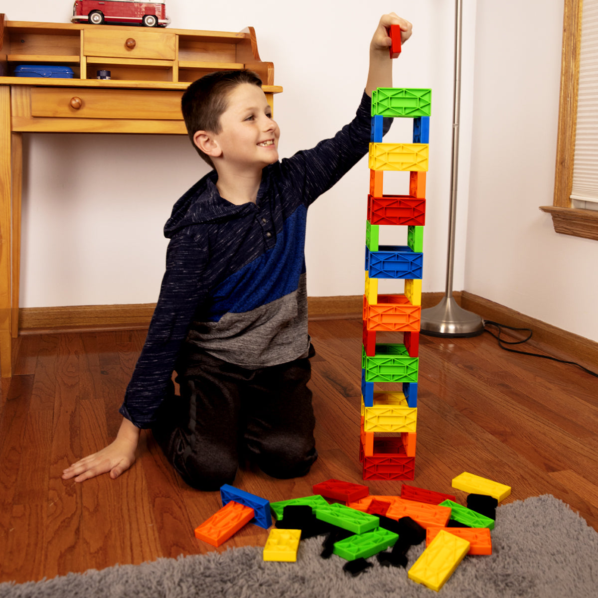 larger than earth dominoes called blokix person stacking